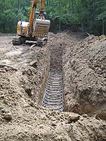 ground source loop - one of five lines buried 5 ft down in our backyard